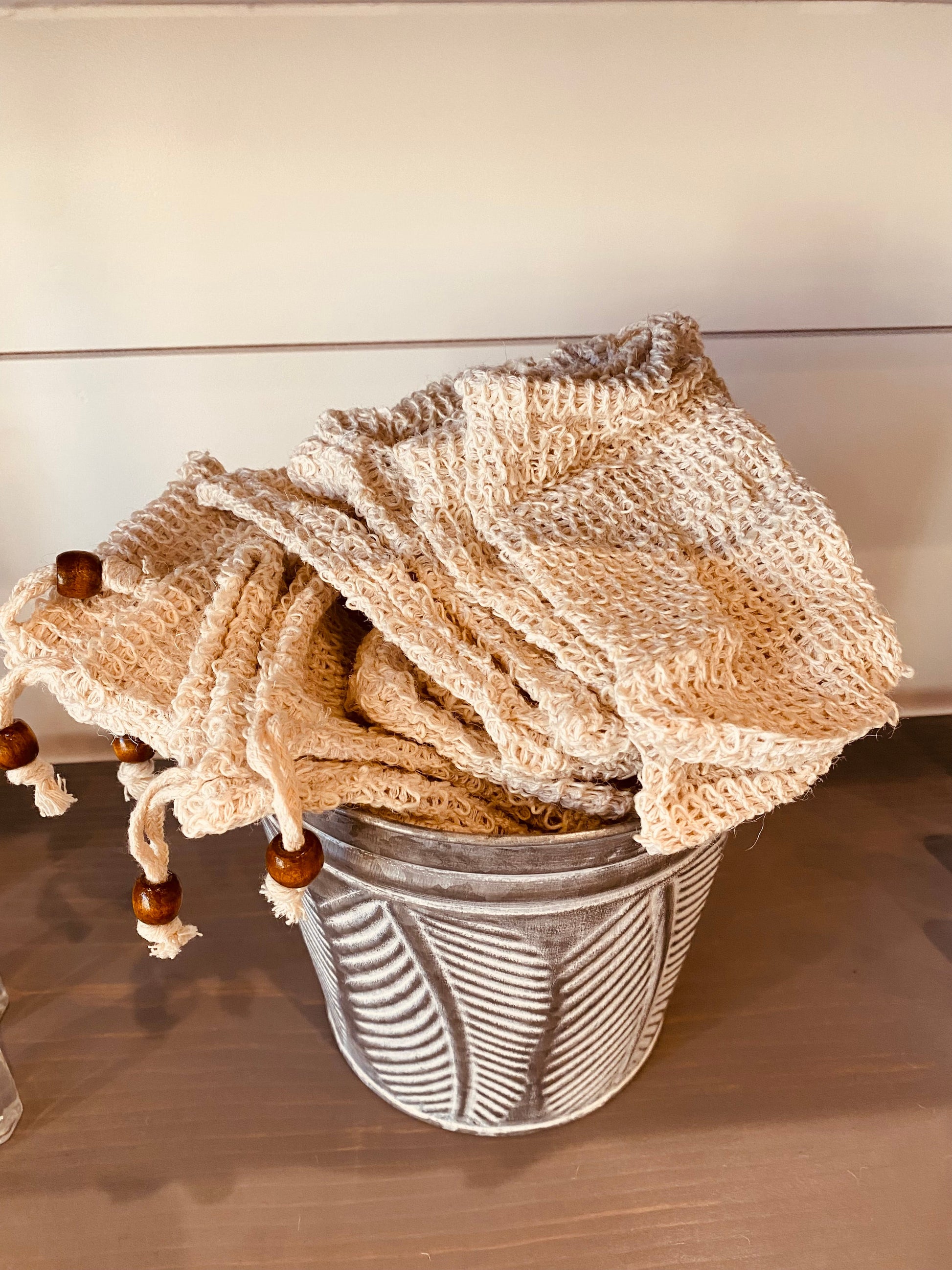Sisal soap pouch by Onic Brands LLC showing a natural fiber pouch for holding soap, ideal for exfoliating and shower use.