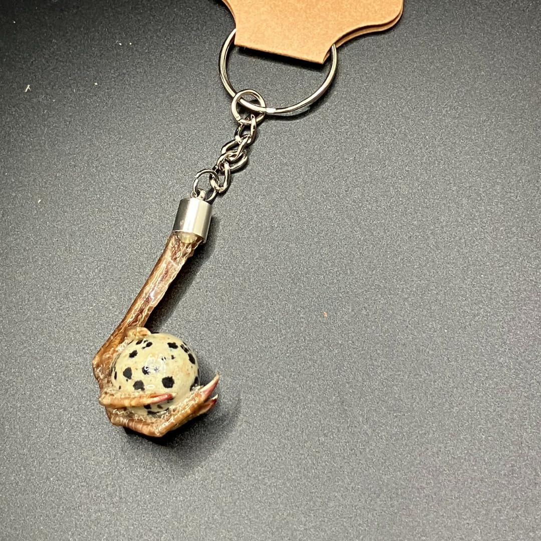 Quailz.com quail foot keychain with faux quail egg stone, featuring detailed bird foot charm and natural-looking egg pendant.