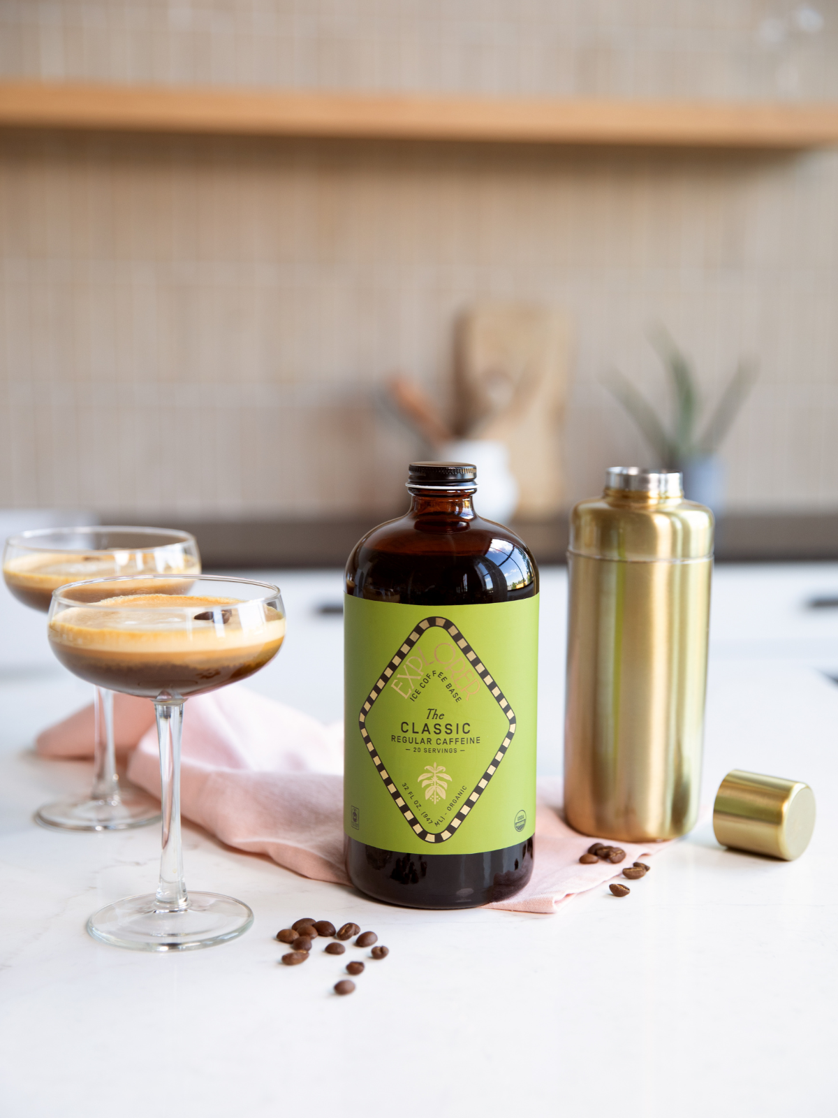 Explorer Cold Brew 32oz cold brew coffee concentrate bottle, featuring a dark liquid inside with a black cap.