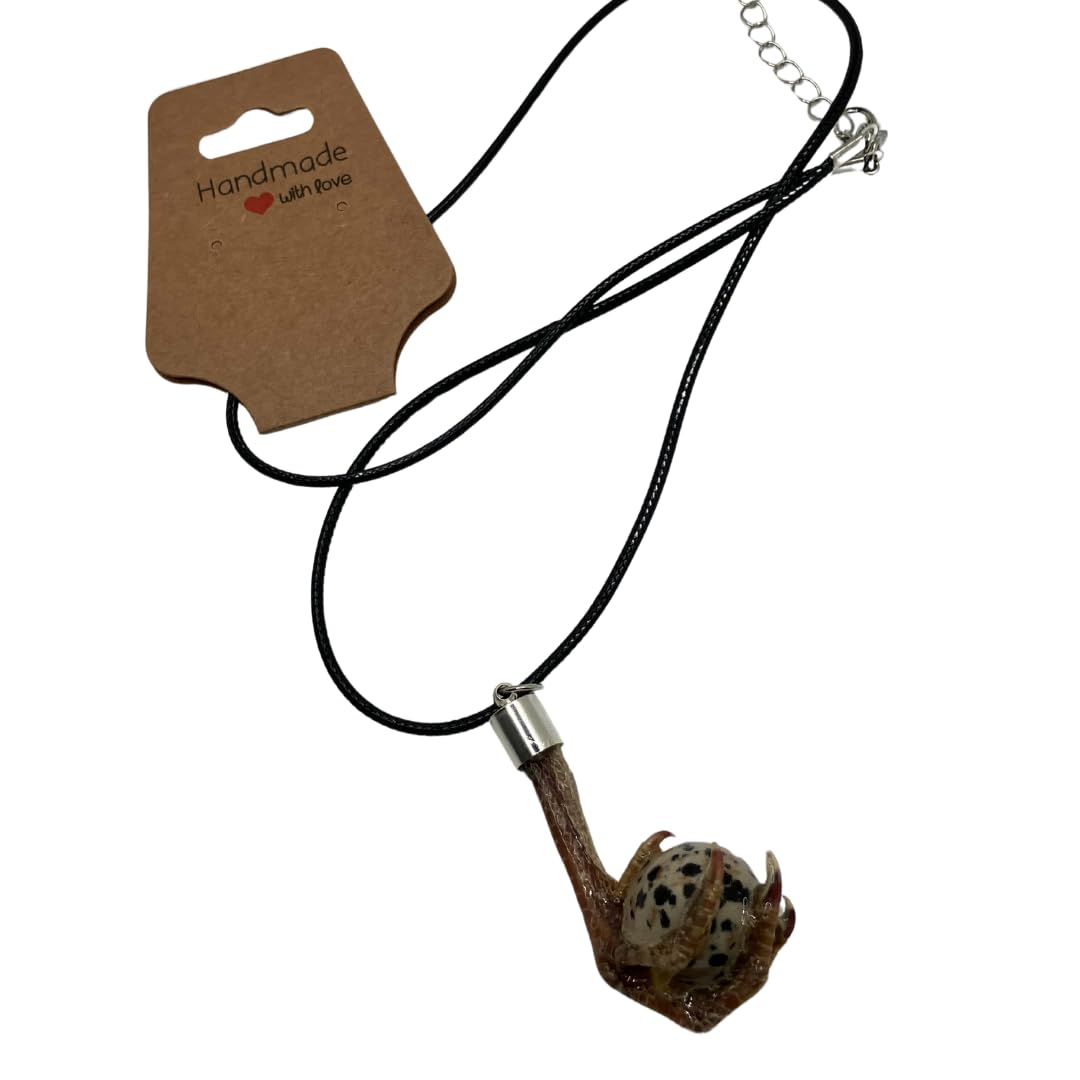 Quailz.com by Undique LLC quail feet necklace with chain showcasing detailed bird foot pendant on a silver chain.