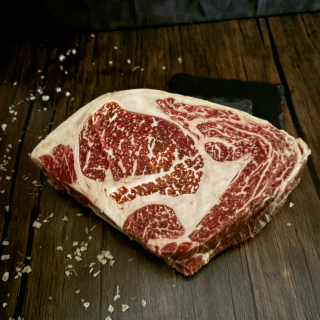Fullblood Wagyu ribeye steak from Five Oaks Farm Griller's Box, showcasing marbled beef ready for grilling.