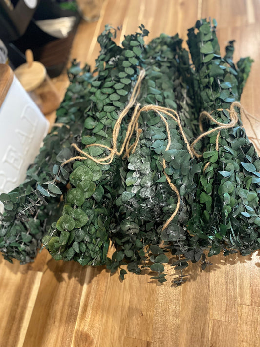 Onic Brands LLC hanging eucalyptus decorative plant with realistic green leaves in a natural-looking arrangement.