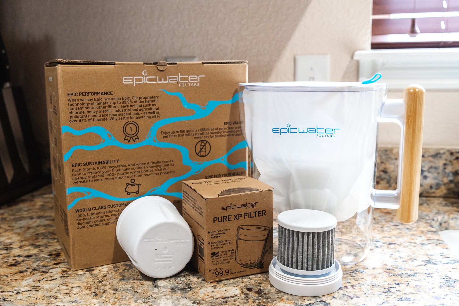 Epic Water Filters Pure XP pitcher in red, designed to reduce fluoride, PFAS, and parasites for clean, safe drinking water.