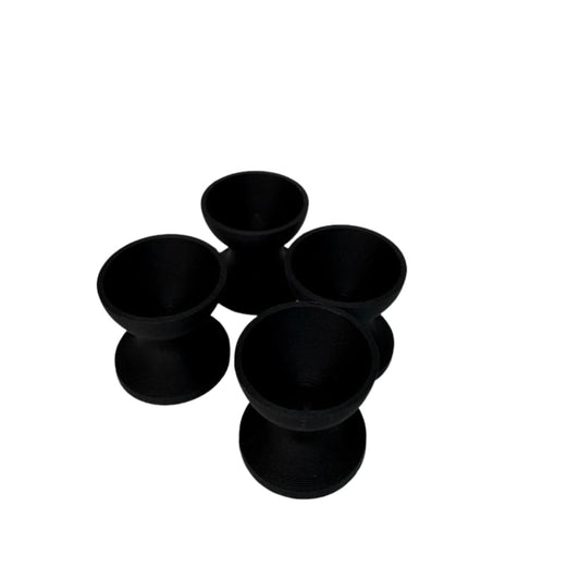 Set of 4 Quail Egg Cup Holders by Quailz.com, mini ceramic egg cups for serving quail eggs in a stylish kitchen display.