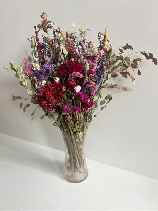 Dried bouquet with berry tones from SMFF Flowers by Sunny Meadows Flower Farm, featuring a mix of dried flowers in red and brown shades.