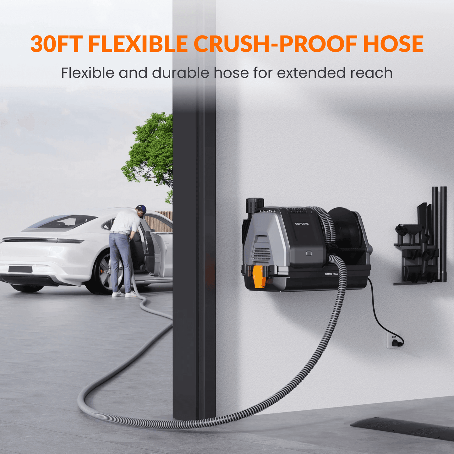 Giraffe Tools US Grandstorm retractable garage vacuum cleaner with hose and attachments, designed for efficient cleaning.