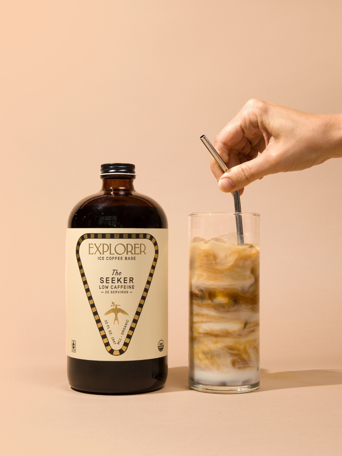 32oz Explorer Cold Brew coffee concentrate bottle with black cap and label for making cold brew coffee at home.