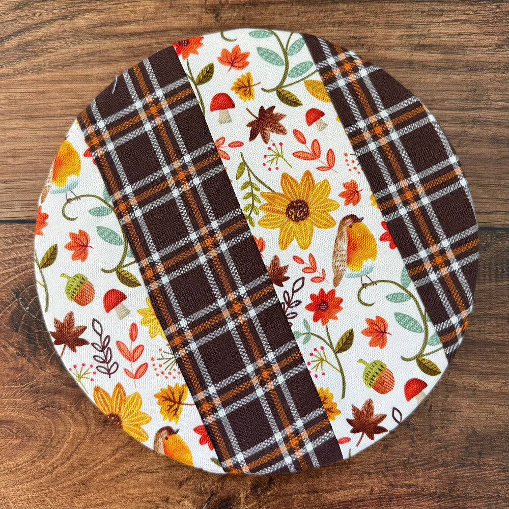 Small bowl and banneton covers from Five Oaks Farm, natural fabric with rustic stitching, used for bread rising and dough proofing.