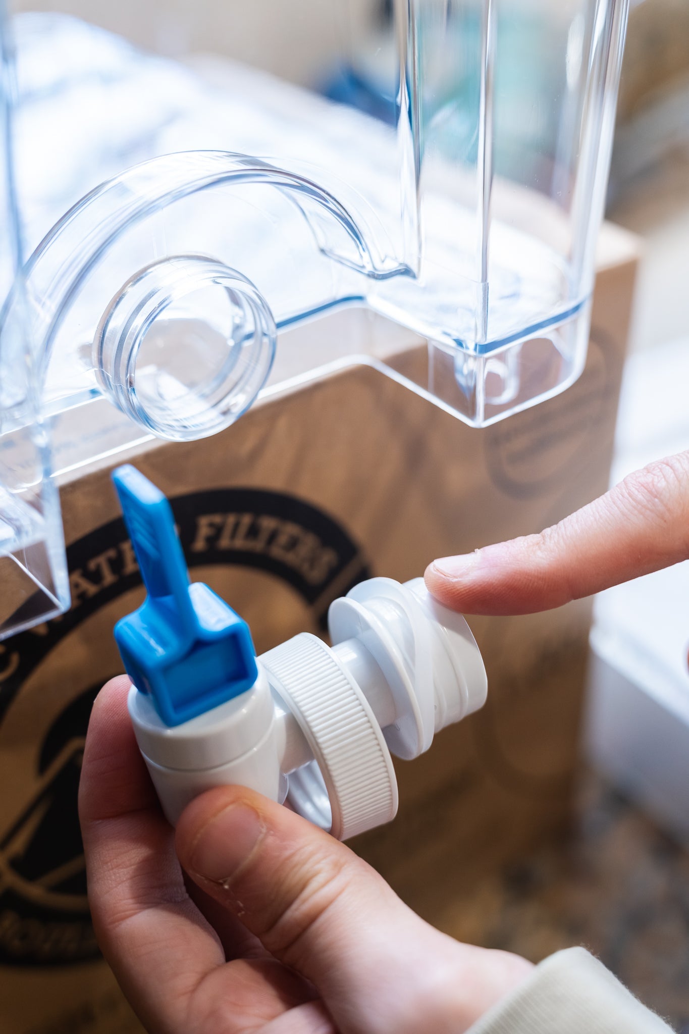 Epic Water Filters USA Pure XP Dispenser in red, designed to reduce fluoride and PFAS from drinking water.