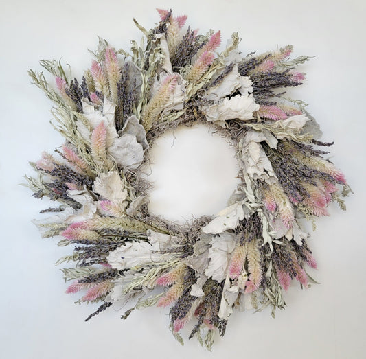 Handmade dried flower wreath with blush tones from Sunny Meadows Flower Farm, featuring dried roses, baby's breath, and greenery.