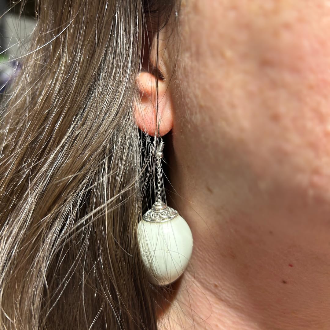 Celadon quail egg earrings from Quailkeeper by Quailz.com, featuring delicate ceramic quail eggs in a stylish jewelry design.