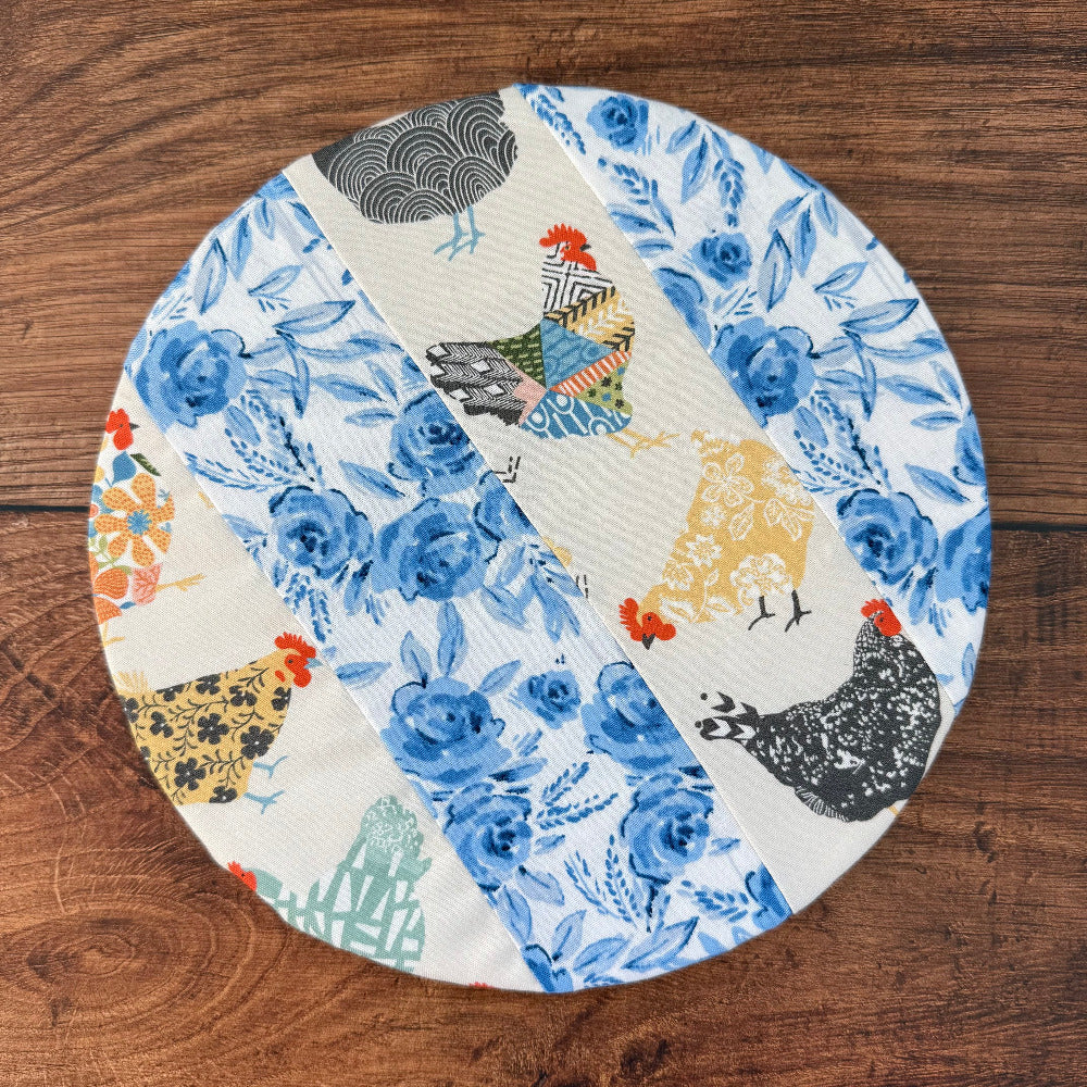 Small bowl and banneton covers from Five Oaks Farm, featuring rustic fabric designs for bread proofing and storage.