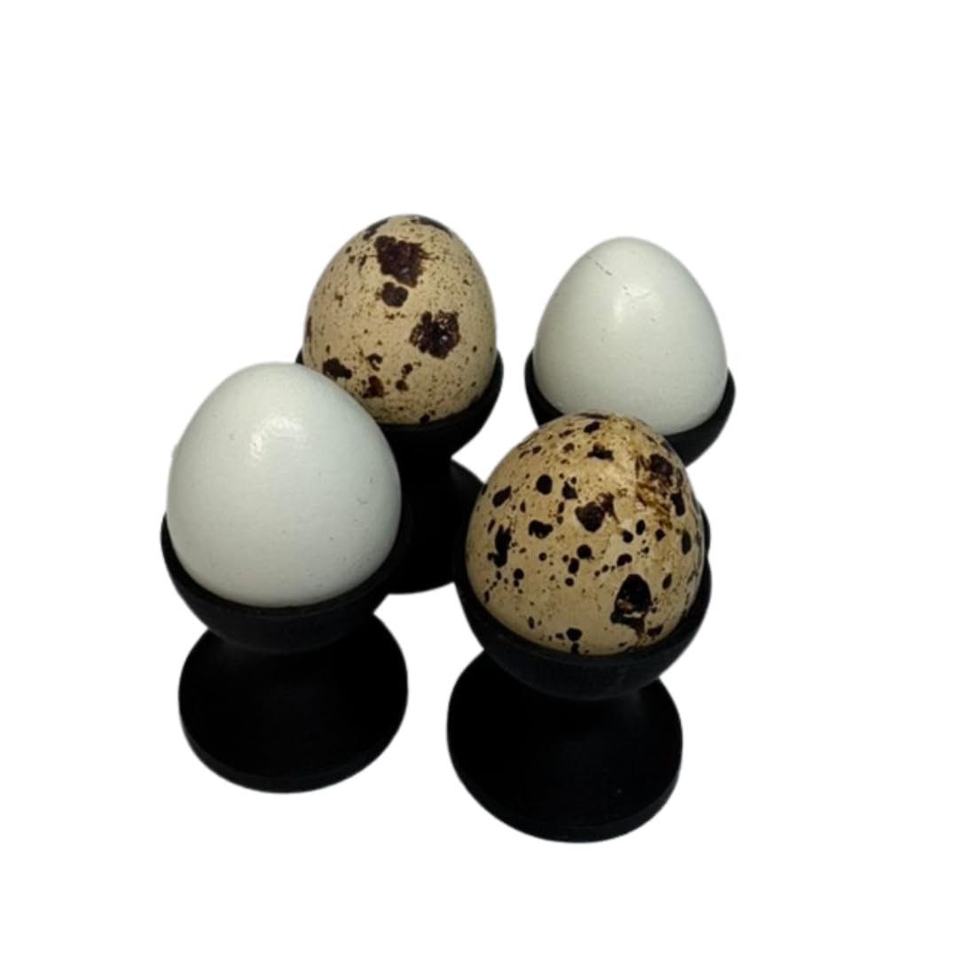 Set of four Quailz mini egg cups for quail eggs, featuring individual holders in a compact, decorative design.