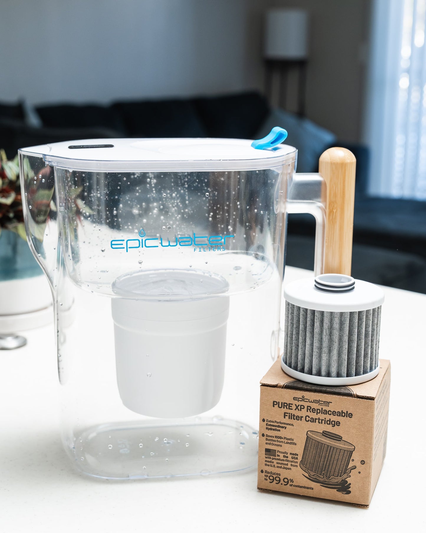 Epic Water Filters Pure XP pitcher in red, designed to reduce fluoride, PFAS, and parasites for clean drinking water.