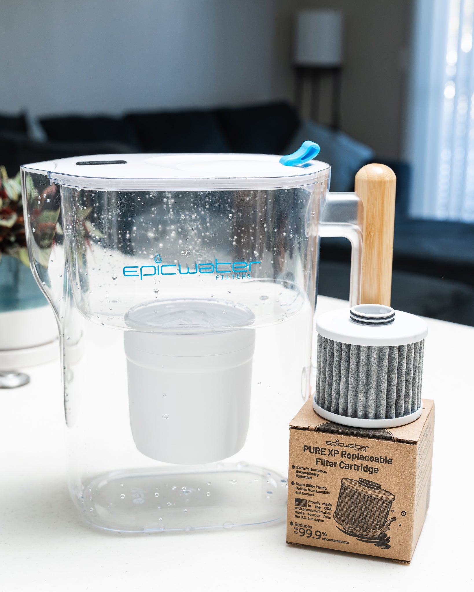 Epic Water Filters Pure XP pitcher in red, designed to reduce fluoride, PFAS, and parasites for clean drinking water.