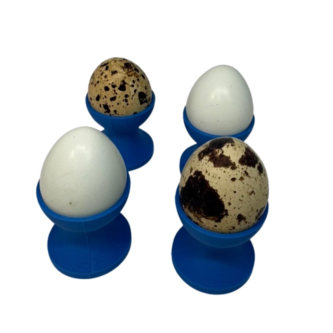 Set of four mini egg cups for quail eggs, made by Quailz.com, featuring compact quail egg holders in a sleek design.