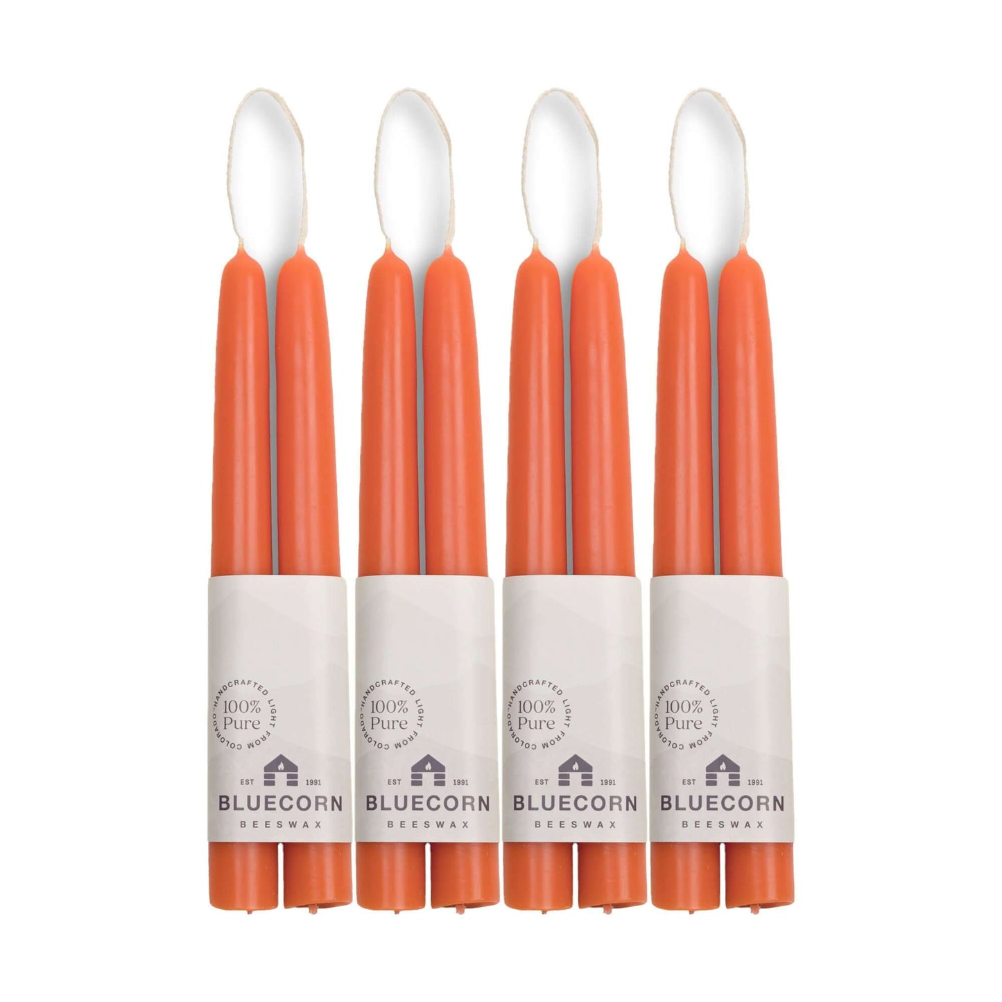 Set of eight 8-inch apricot pink beeswax taper candles from Bluecorn Candles in a bulk bundle.