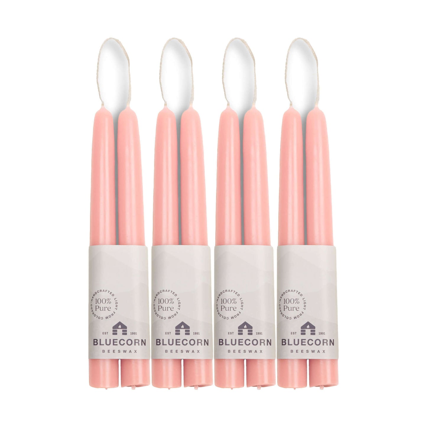 Set of eight 8-inch pink beeswax taper candles from Bluecorn Candles, handcrafted and hand-dipped for elegant lighting.