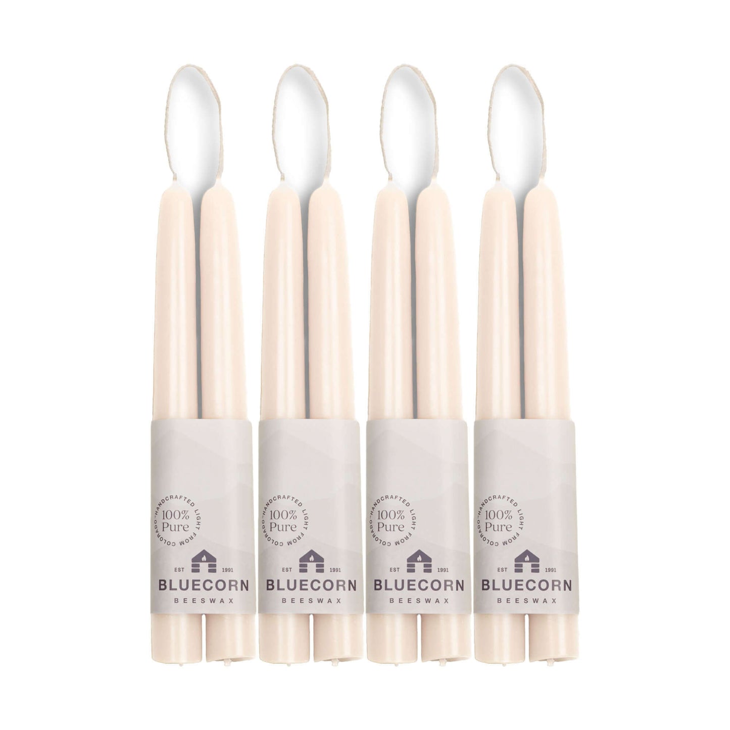 Eight 8-inch white beeswax taper candles from Bluecorn Candles in a bulk set, ideal for decorative or ceremonial use