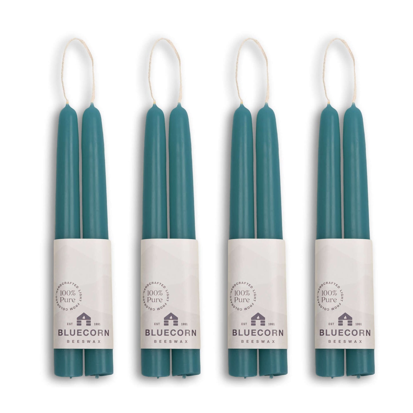 Set of two 8-inch teal Bluecorn Beeswax Taper Candles in a bundle, showcasing natural hand-dipped beeswax finish and classic taper shape.