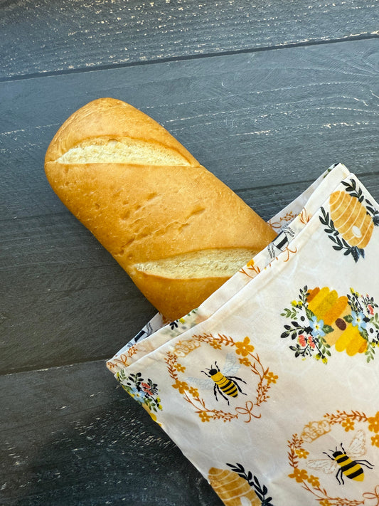 Beeswaxed baguette bag from Five Oaks Farm, natural cotton with beeswax coating, showcasing its rustic design and handcrafted detail.