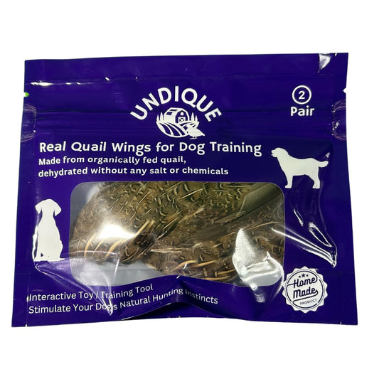 Pair of real quail wings for dog training, showcasing fresh, natural bird wings from Quailz.com by Undique LLC for training treats.