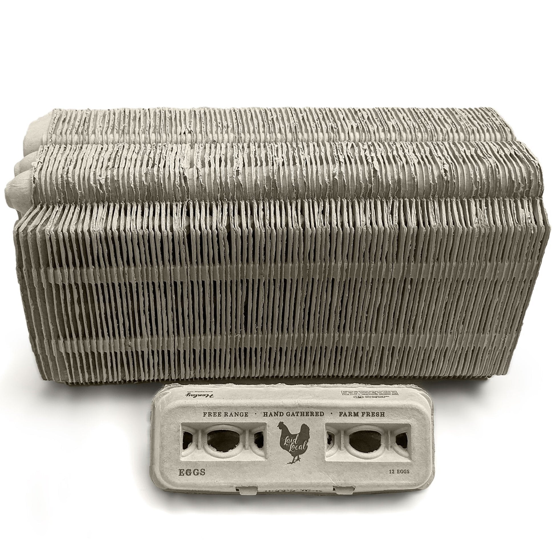 A stack of nested Henlay Laid Local Egg Cartons from My Pet Chicken, featuring an adorable vintage design for a dozen eggs, stands behind a single printed carton labeled “Free Range Hand Gathered Farm Fresh Eggs” with a chicken illustration.