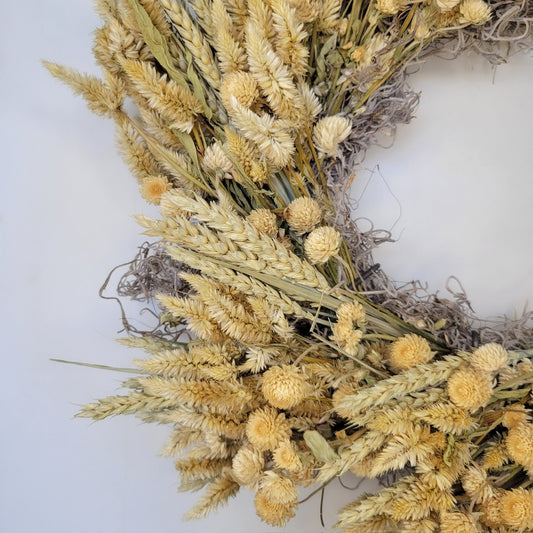 Handmade dried flower wreath in ivory with preserved blooms, created by Sunny Meadows Flower Farm for natural home decor.