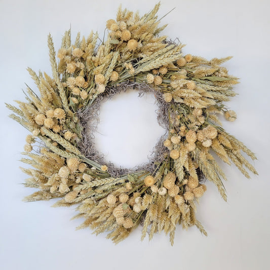 Handmade dried flower wreath in ivory with various dried flowers, crafted by Sunny Meadows Flower Farm.