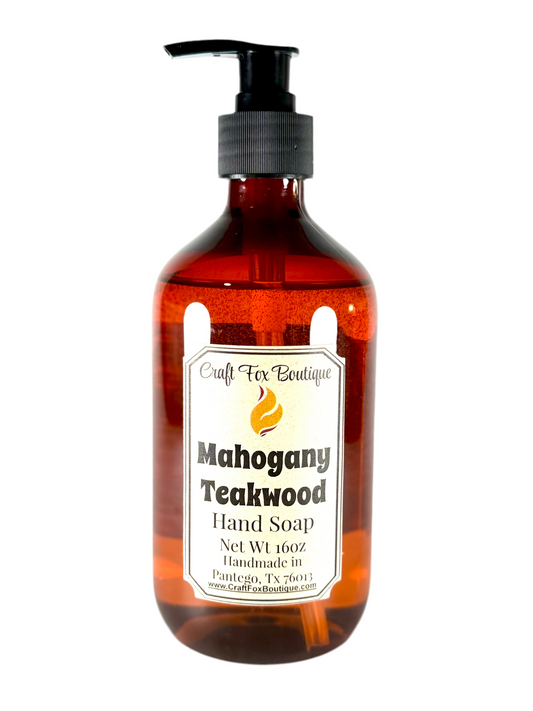 Craft Fox Boutique Mahogany Teakwood 16oz hand soap with a clear bottle and pump dispenser, showcasing its elegant design.