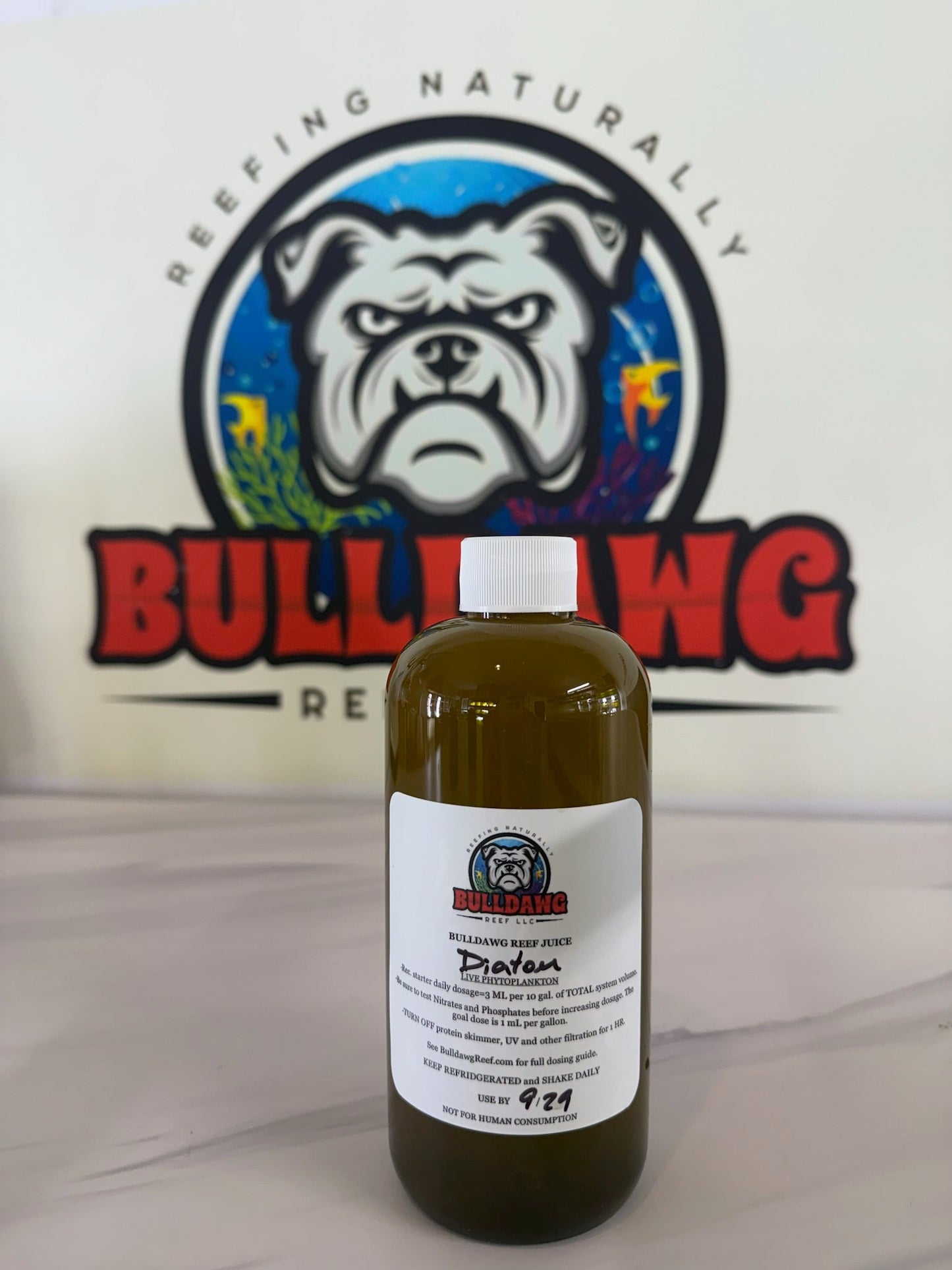 Bulldawg Reef Juice Diatom Blend bottle with label, showcasing Reef Aquarium supplement by Bulldawg Reef LLC.