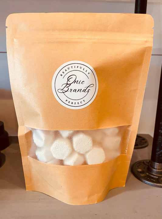 Onic Brands all natural dishwasher tabs in a box with several tabs visible, showcasing eco-friendly cleaning product.