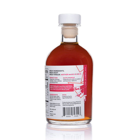 Back label of American Vinegar Works cranberry apple cider vinegar bottle showing product details and branding.