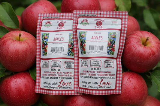 Freeze-dried apples by Double L Ranch in a clear bowl, showcasing crunchy, golden apple slices on a white background.