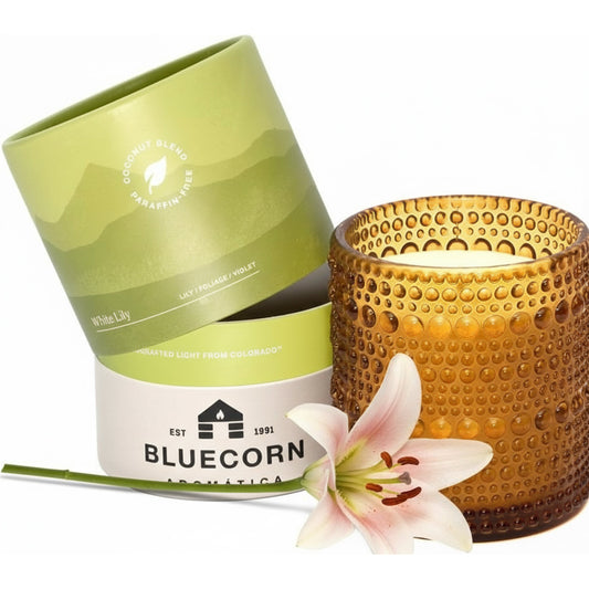 White Lily scented candle in glassware by Bluecorn Candles, showcasing a clean, elegant design with a white lily motif.