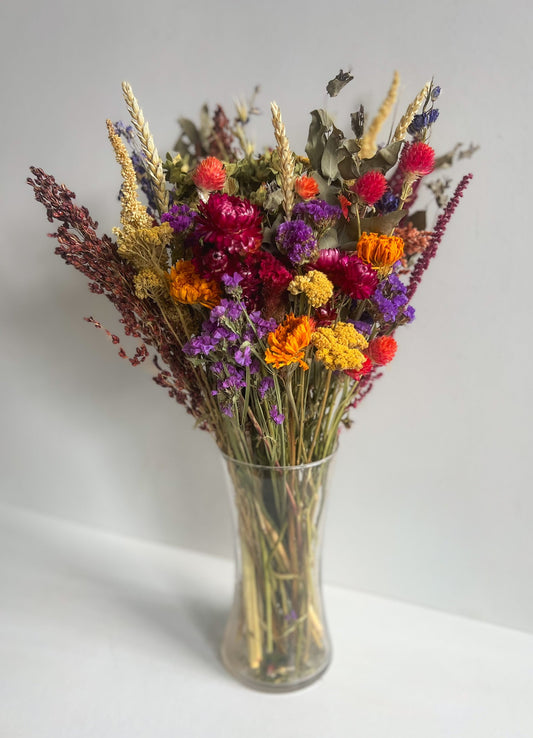 Bright and cheery dried bouquet of SMFF Flowers from Sunny Meadows Flower Farm featuring colorful, preserved floral arrangements.
