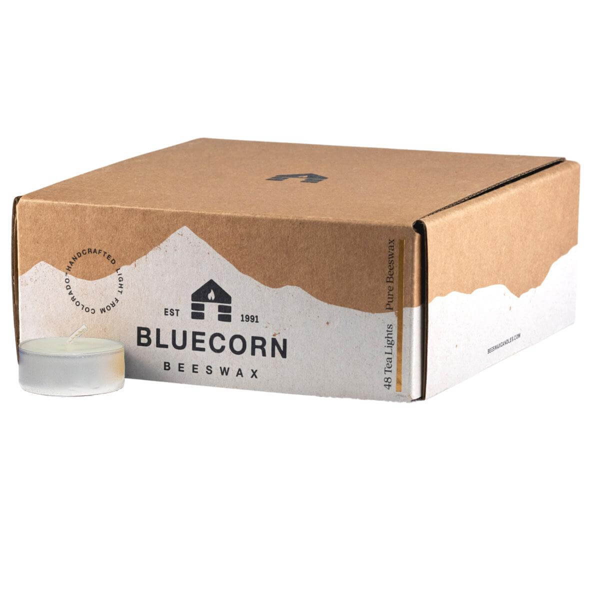 Pure beeswax tea light candles in ivory with metal holders from Bluecorn Candles, showcasing their warm glow and smooth finish.