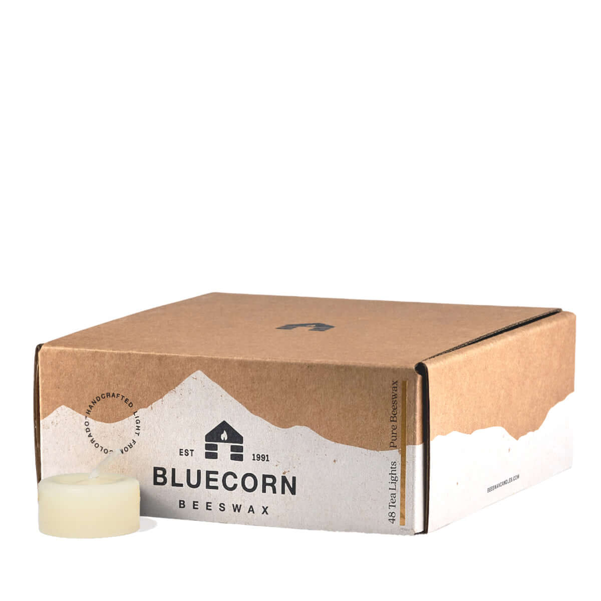 Set of ivory beeswax tea light candles by Bluecorn Candles, small round candles in a clear container for ambiance.