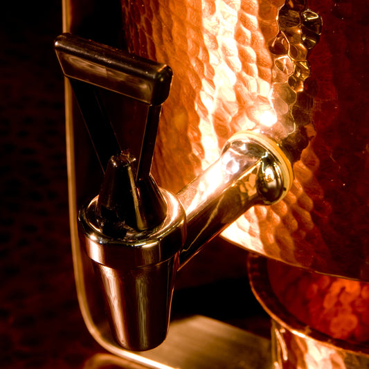 Copper hot and cold water dispenser spigot replacement for Sertodo drink dispensers, featuring a sturdy metal tap.