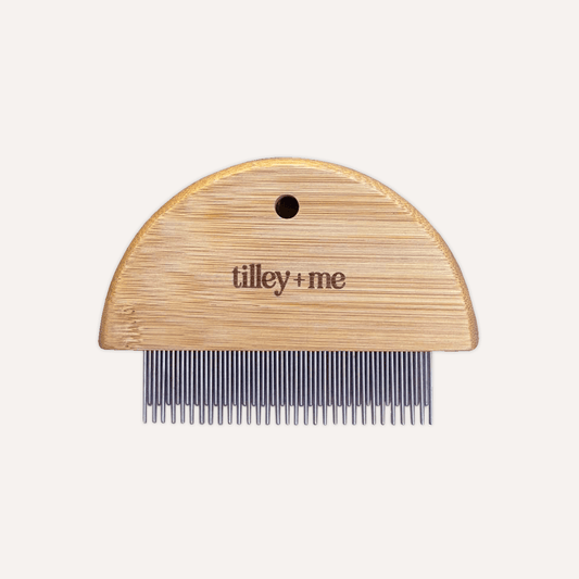 Bamboo flea comb for dogs and cats from Tilley + Me, gentle and eco-friendly dog grooming tool with tan bamboo handle.