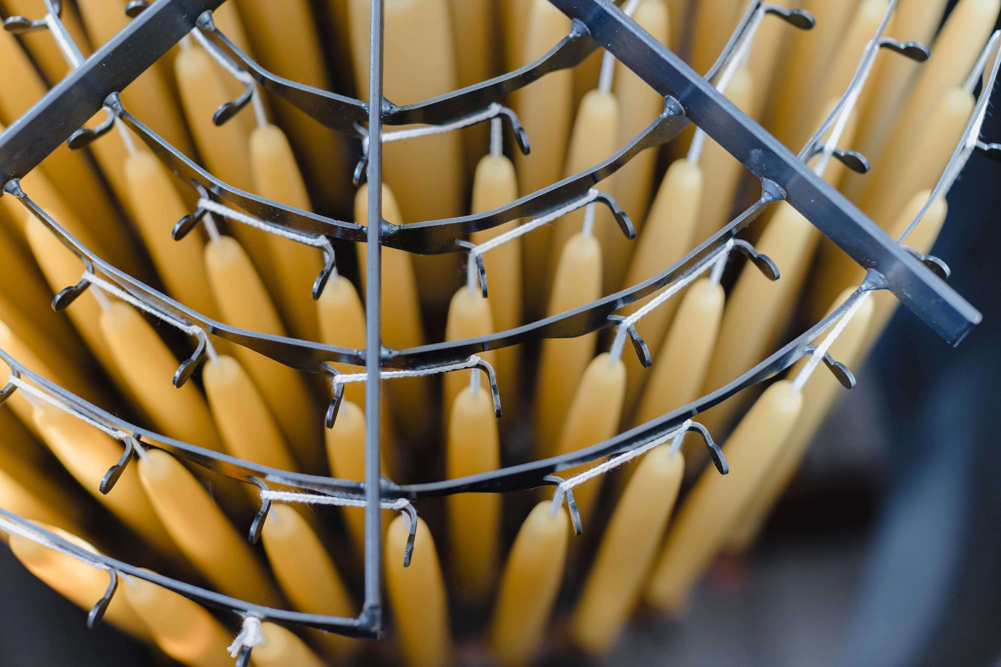 Pair of Bluecorn Candles hand-dipped beeswax taper candles in natural yellow, made in the USA, displayed in a bulk 4-pair bundle.