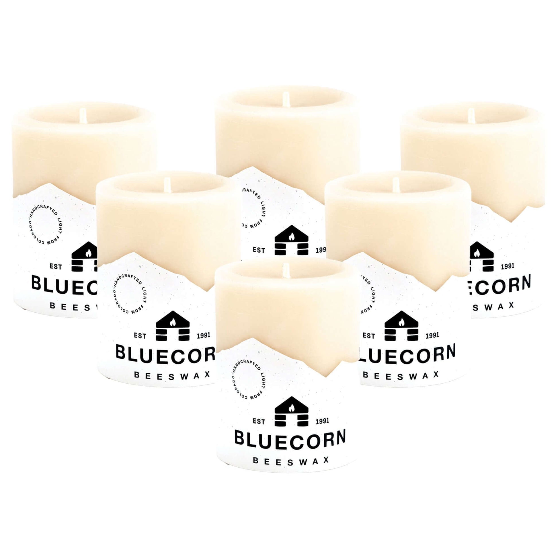 Set of six Ivory Pure Beeswax Pillar Candles by Bluecorn Candles, showcasing natural white, smooth finish, ideal for home decor or lighting.