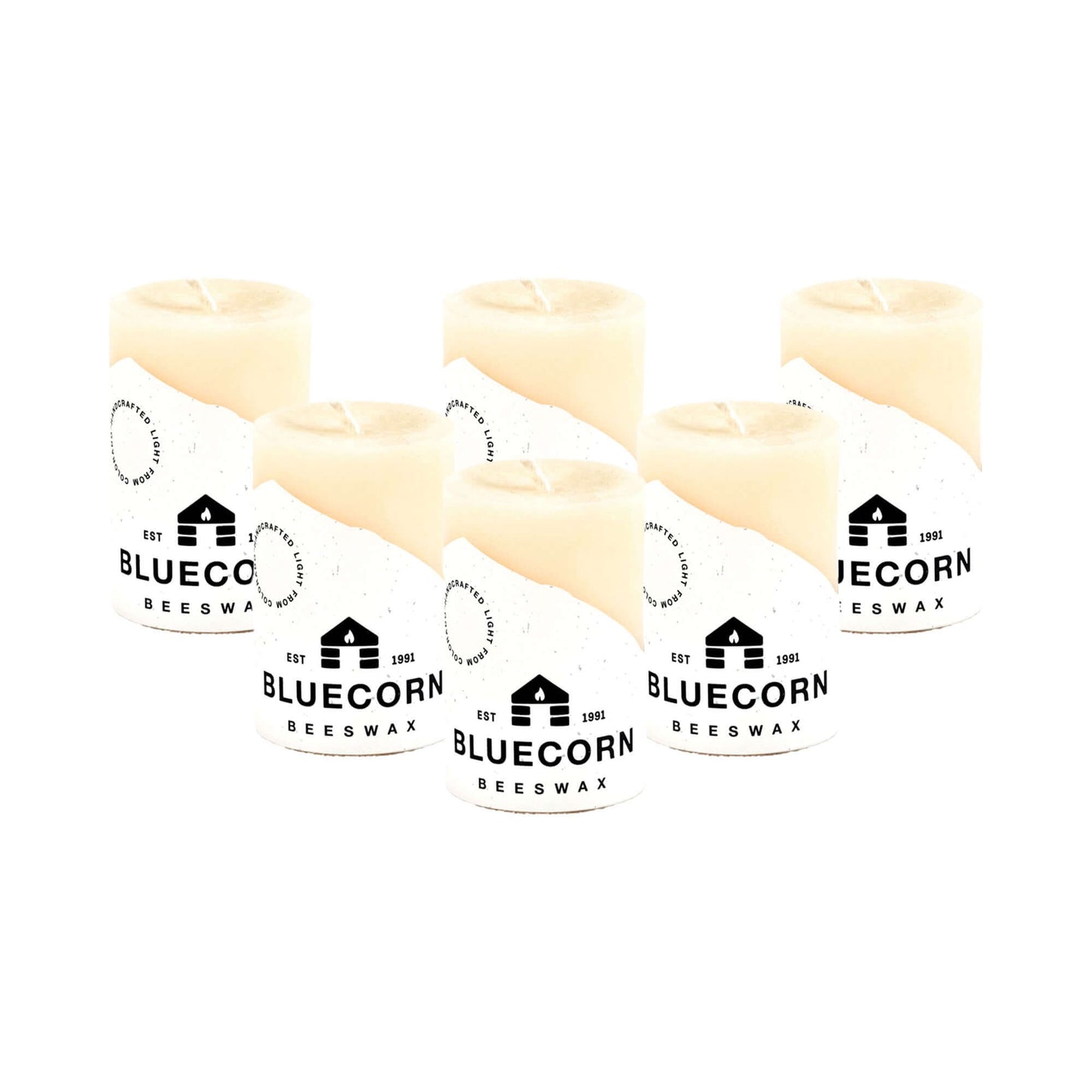Set of six ivory pure beeswax pillar candles by Bluecorn Candles, 2x3 inches, natural and handcrafted for home decor.