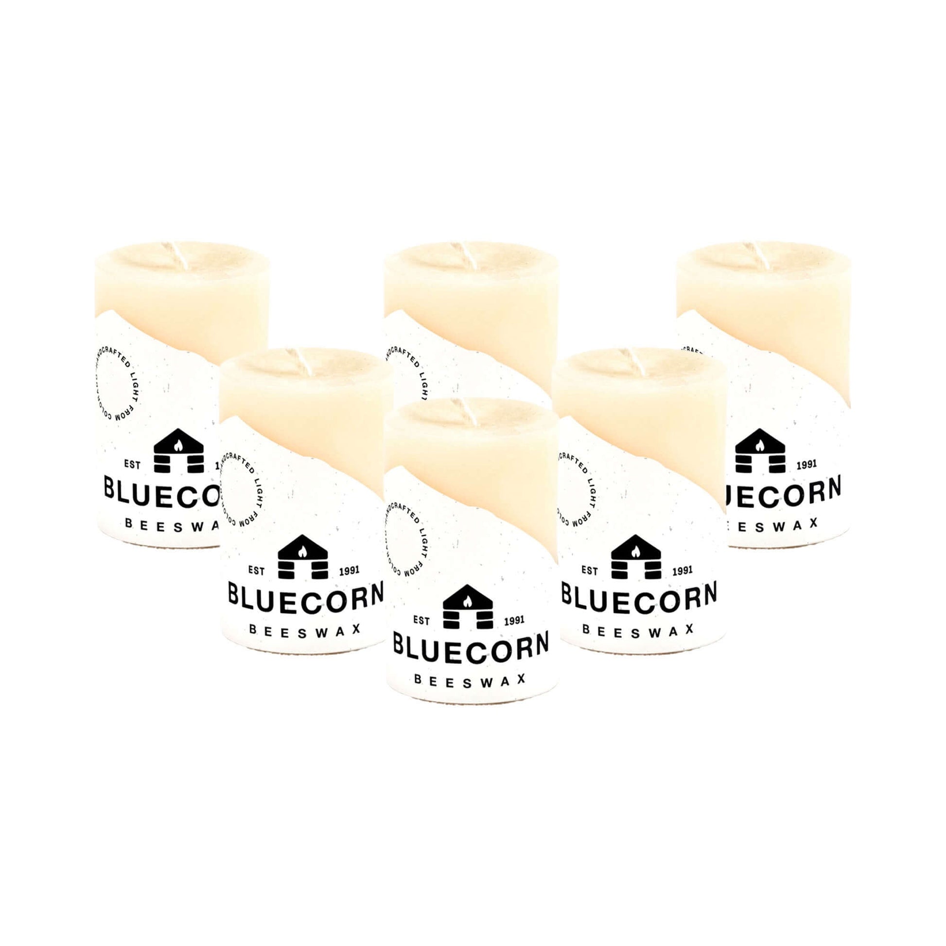 Set of six ivory pure beeswax pillar candles by Bluecorn Candles, 2x3 inches, natural and handcrafted for home decor.