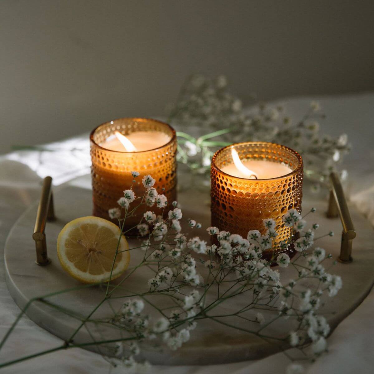 White Lily scented candle in glassware by Bluecorn Candles, handmade and non-toxic, perfect for fall ambiance.