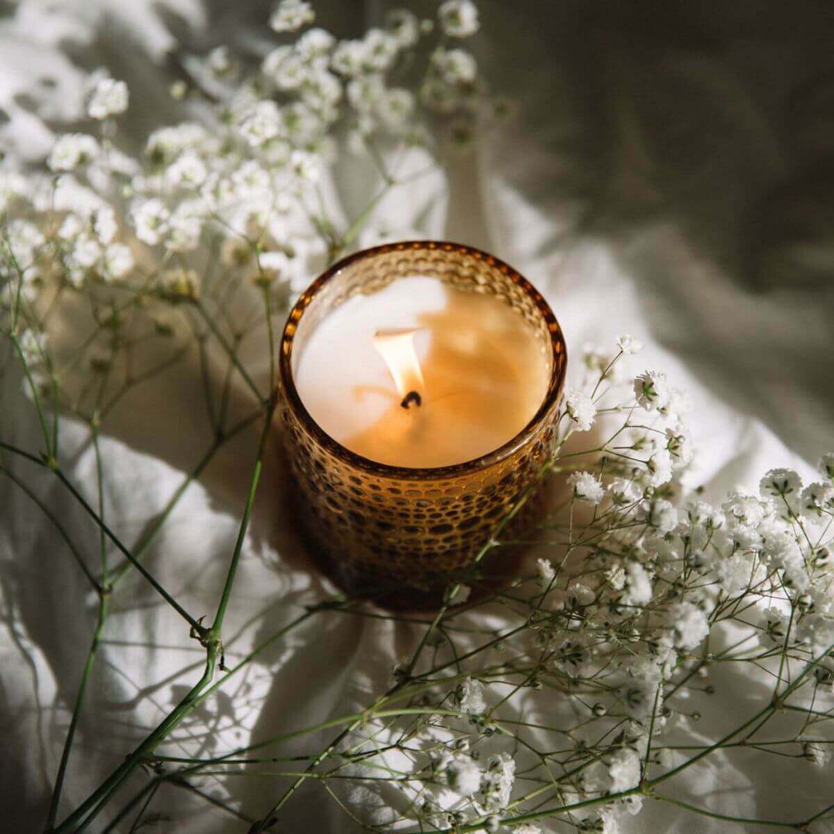 Bluecorn Candles Paloma Scented Candle in glassware with autumn-themed design, handmade and non-toxic for a cozy atmosphere.