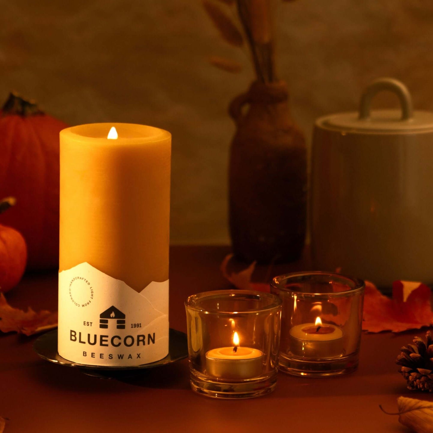 Bluecorn Candles pure beeswax pillar candles and tea lights in glass holders, natural fall decor with 3x6 raw beeswax pillars.
