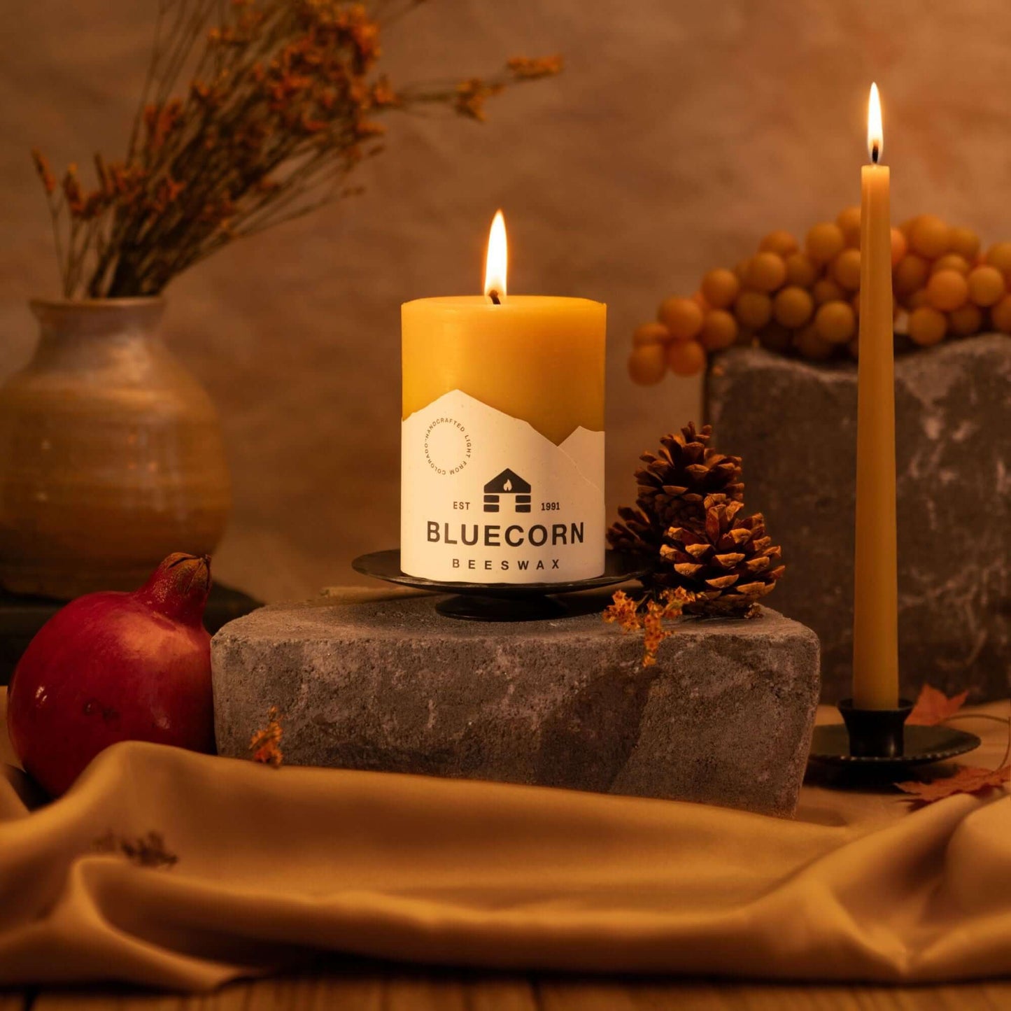 Bluecorn Candles hand-dipped beeswax taper candles and matching candleholders, perfect for fall and winter décor.