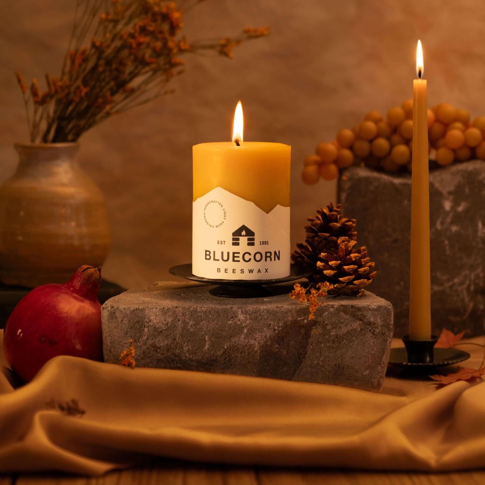 Bluecorn Candles hand-dipped beeswax taper candles and matching candleholders, perfect for fall and winter décor.