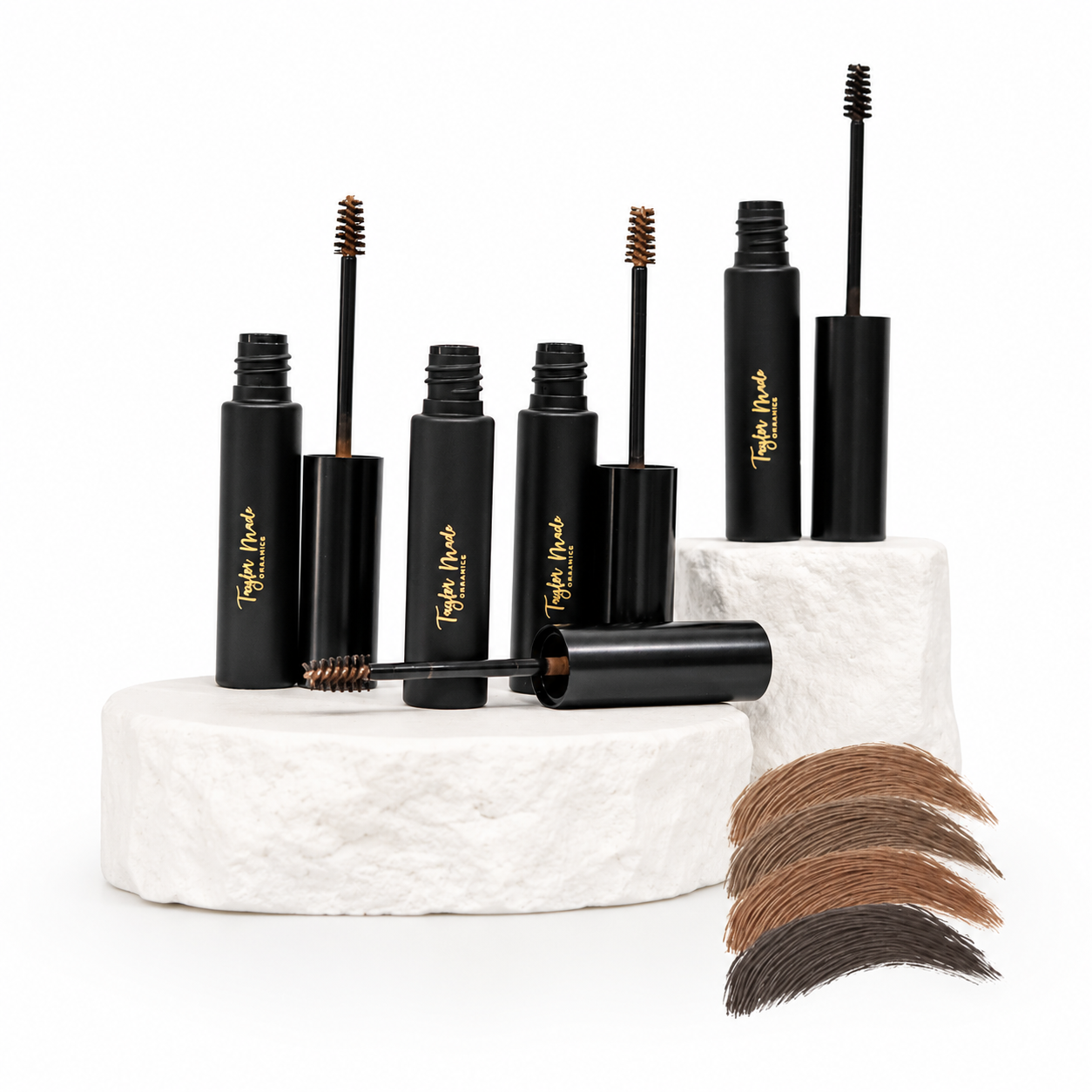 Taylor Made Organics brow gel for tinting and taming eyebrows, featuring a brush applicator and natural finish.